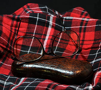 sunglasses with black frame and brown case thumbnail