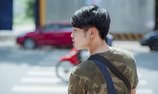 Man in Green and Gray Camouflage Shirt thumbnail