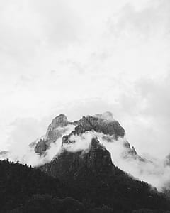 cloud covered mountain photography thumbnail