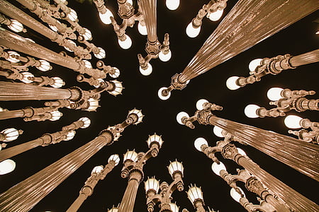 low angle photography of lighted lamp posts thumbnail