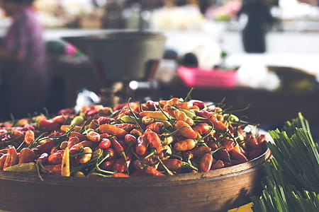 Focus Photo of Round Brown Wooden Bowl Filled With Chili Lot thumbnail