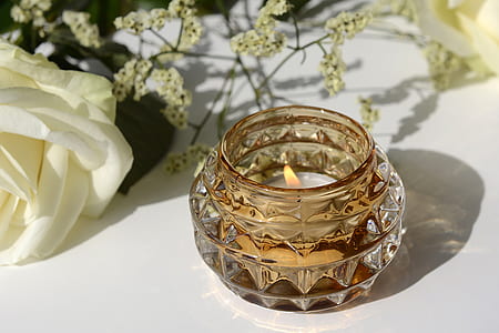 white tealight candle in glass container thumbnail