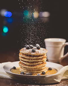 pancakes with sprinkles on a white plate thumbnail