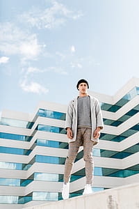 man standing on ledge thumbnail