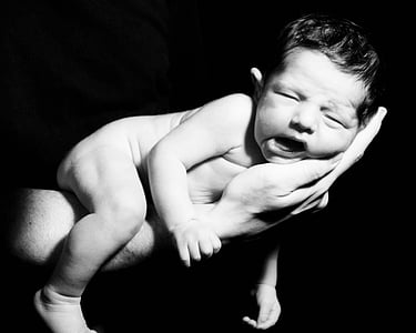 human holding a baby thumbnail