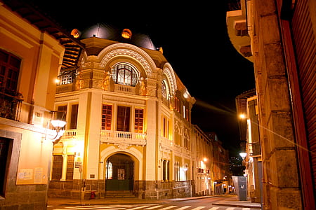 architectural photography of gray concrete dome at the center of the city thumbnail