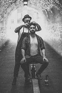 grayscale photo of two man inside dome road thumbnail