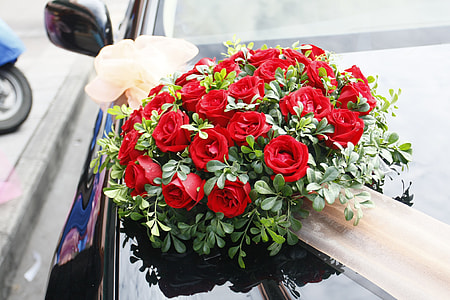 red roses on black vehicle thumbnail