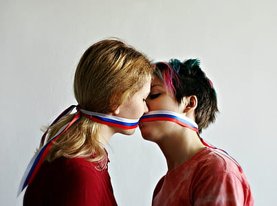 two woman kissing each other thumbnail