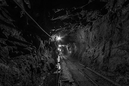 gray scale of train rail tunnel thumbnail