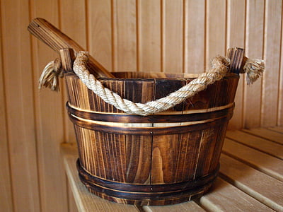 brown wooden bucket on brown wooden surface thumbnail