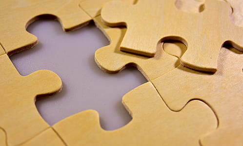 close-up photo of brown jigsaw puzzle thumbnail
