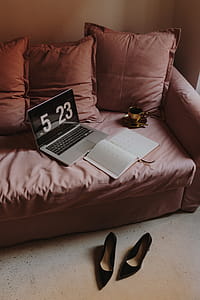 Workplace with a laptop on a pink couch thumbnail