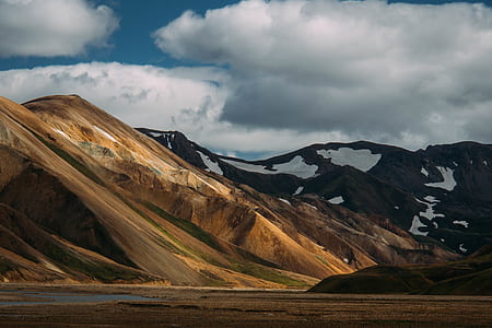 brown mountain during daytime thumbnail