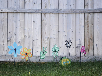 outdoor decoration beside wooden fence thumbnail
