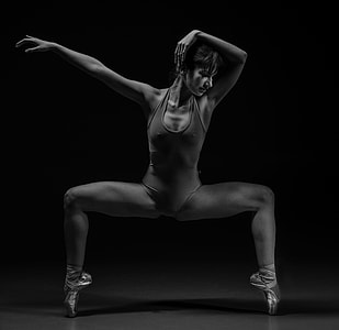 grayscale photography of Woman in leotard making post thumbnail