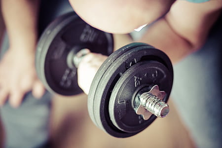 person lifting dumbbell thumbnail