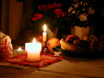 lighted candles beside fruits thumbnail