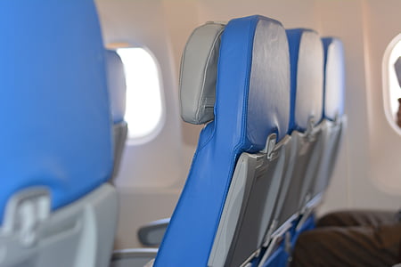 selective focus photography of airplane seats thumbnail