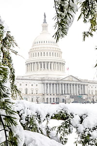 white dome building covered with snow thumbnail