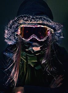 person in wearing snow goggles and parka coat wallpaper thumbnail