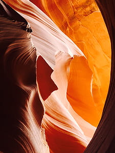 Swirling red rock wallpaper, low angle photography of antelope canyon thumbnail