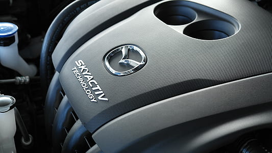 closed-up photo of gray Mazda Skyactiv Technology engine thumbnail