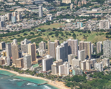 aerial photography of buildings near ocean taken at daytime thumbnail
