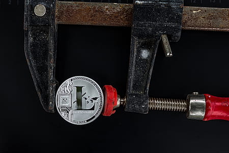 black and red F-clamp on black background thumbnail