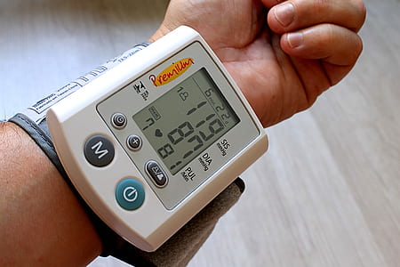 digital blood pressure monitor showing 119/87 thumbnail