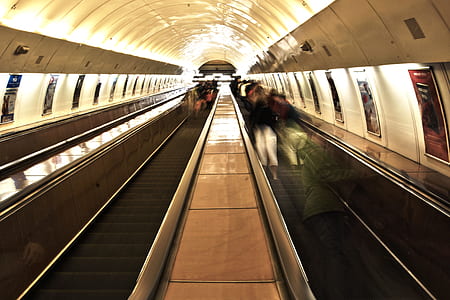 people on escalator machine thumbnail