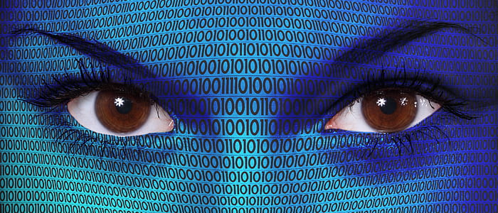 edit photo of woman's eyes with binary numbers on her skin thumbnail