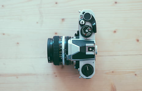 flat-lay photography of DSLR camera thumbnail
