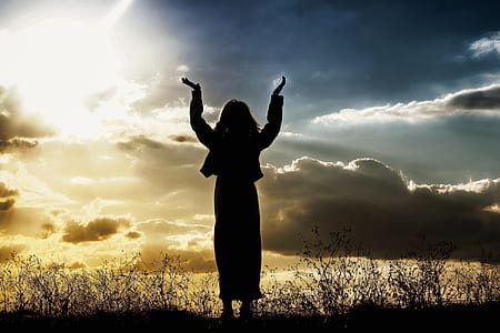 silhouette of person at golden hour thumbnail