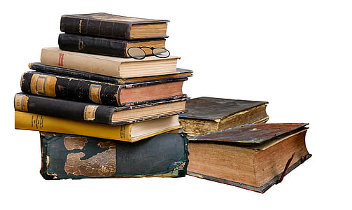 assorted leather-covered book stacks thumbnail