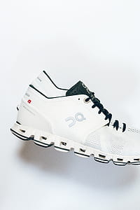 unpaired white and green low-top sneaker thumbnail