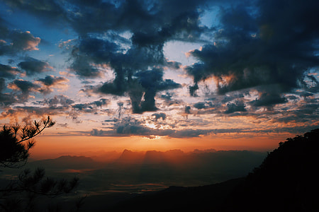 photography of mountains during sunset thumbnail