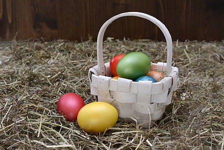 white wicker basket and easter eggs thumbnail
