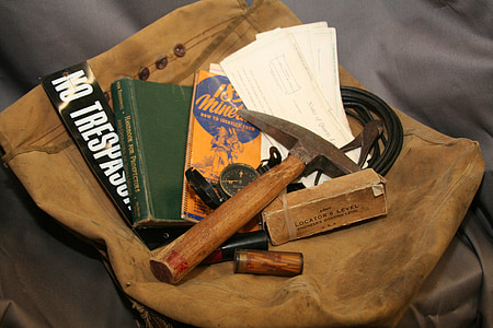 assorted mining tools on brown bag thumbnail