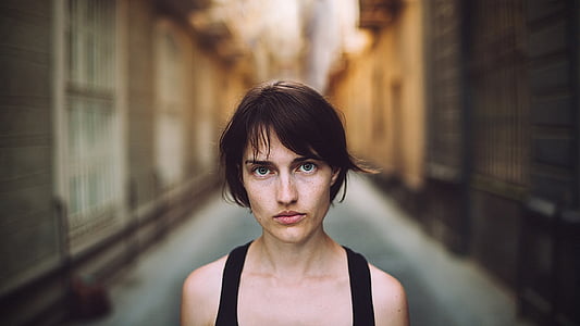 shallow focus photography of a woman in black tank top thumbnail
