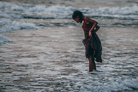 Girl Standing on Seashore thumbnail