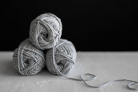 three gray yarn balls thumbnail