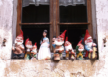 assorted ceramic gnome figurine lot thumbnail