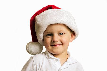boy wearing Santa hat thumbnail