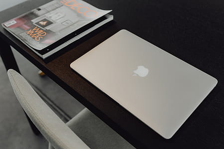 Stylish workspace with MacBook computer on home or studio thumbnail