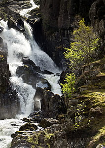 high angle photo of waterfalls thumbnail