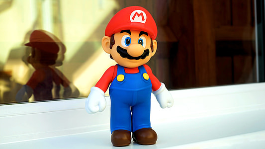 Super Mario figurine during daytime thumbnail