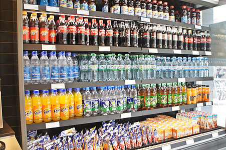 beverage bottles on shelf thumbnail