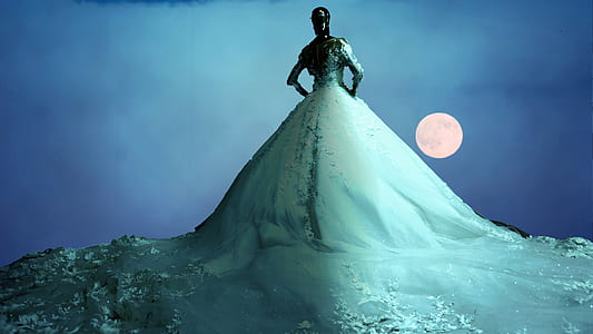 person on top of the white mountain beside white full moon digital wallpaper thumbnail