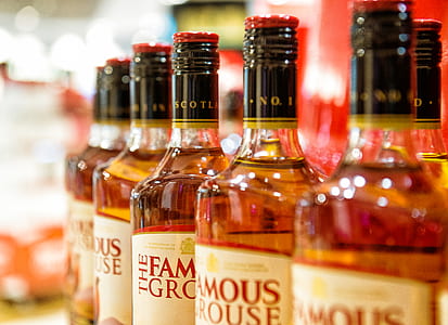 selective photography of The Famous Grouse bottle lot thumbnail